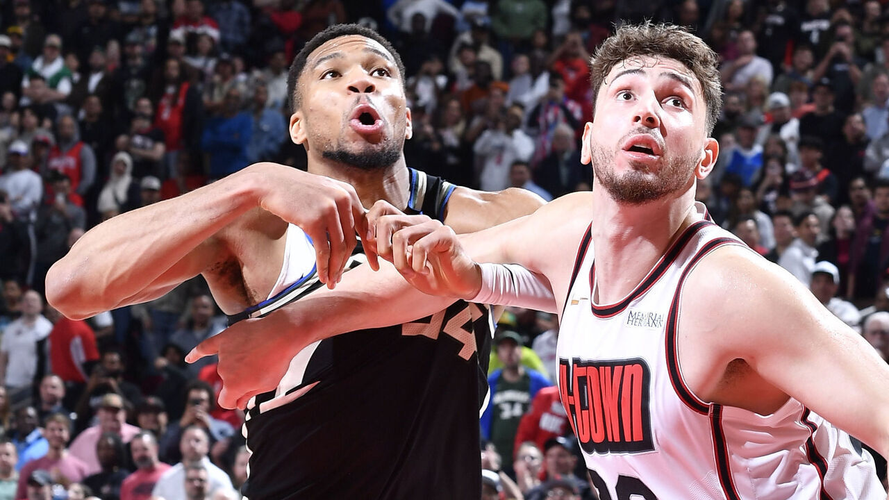 HOUSTON, TX - FEBRUARY 25: Alperen Sengun #28 of the Houston Rockets and Giannis Antetokounmpo #34 of the Milwaukee Bucks wait for a rebound during the game on February 25, 2025 at the Toyota Center in Houston, Texas. Mandatory Copyright Notice: Copyright 2025 NBAE