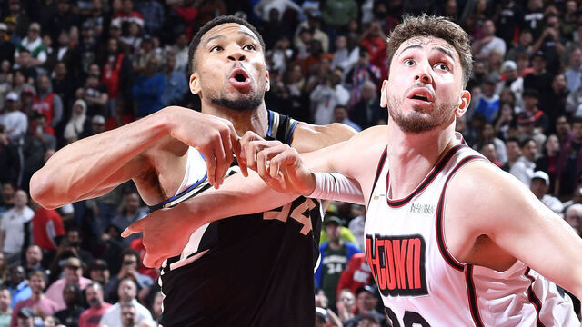 HOUSTON, TX - FEBRUARY 25: Alperen Sengun #28 of the Houston Rockets and Giannis Antetokounmpo #34 of the Milwaukee Bucks wait for a rebound during the game on February 25, 2025 at the Toyota Center in Houston, Texas. Mandatory Copyright Notice: Copyright 2025 NBAE