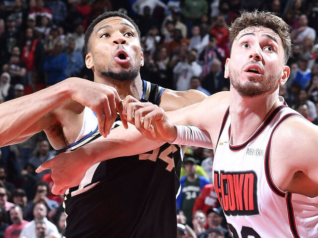 HOUSTON, TX - FEBRUARY 25: Alperen Sengun #28 of the Houston Rockets and Giannis Antetokounmpo #34 of the Milwaukee Bucks wait for a rebound during the game on February 25, 2025 at the Toyota Center in Houston, Texas. Mandatory Copyright Notice: Copyright 2025 NBAE