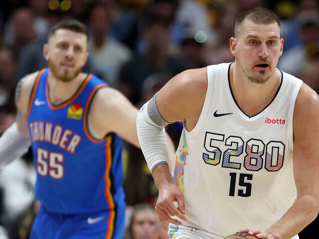 DENVER, COLORADO - MAY 15: Nikola Jokic #15 of the Denver Nuggets dribbles the ball ahead of Isaiah Hartenstein #55 of the Oklahoma City Thunder during the first quarter in Game Six of the Western Conference Second Round NBA Playoffs at Ball Arena on May 15, 2025 in Denver, Colorado.