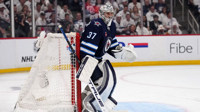 WINNIPEG, CANADA - MAY 15: Connor Hellebuyck #37 of the Winnipeg Jets defends the goal against the Dallas Stars during the third period in Game Five of the Second Round of the 2025 Stanley Cup Playoffs at Canada Life Centre on May 15, 2025 in Winnipeg, Manitoba, Canada.
