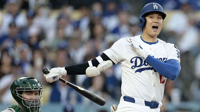 LOS ANGELES, CALIFORNIA - MAY 15: Shohei Ohtani #17 of the Los Angeles Dodgers reacts in front of Shea Langeliers #23 of the Athletics during his at bat in the first inning at Dodger Stadium on May 15, 2025 in Los Angeles, California.