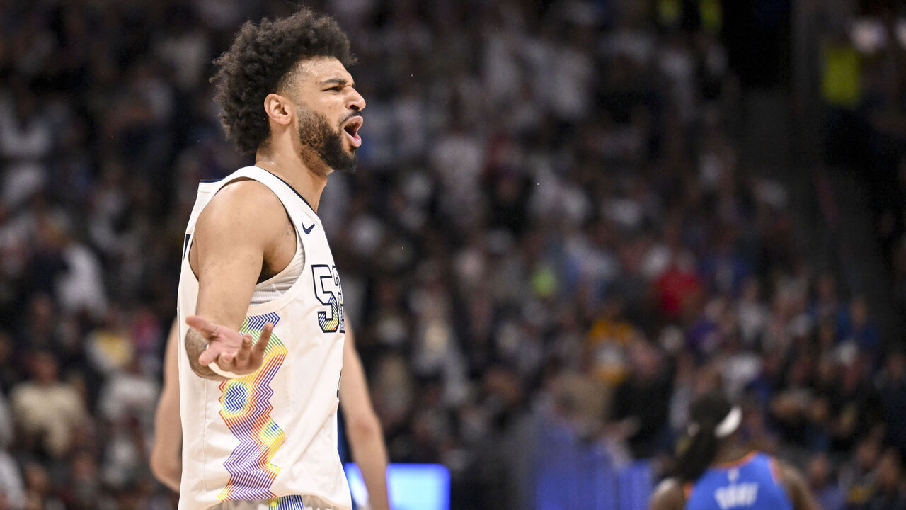 DENVER, CO - MAY 15: Jamal Murray (27) of the Denver Nuggets plays to the crowd afte mimicking the foul-drawing body movements of Shai Gilgeous-Alexander (2) of the Oklahoma City Thunder during the third quarter of the Nuggets' 119-107 win at Ball Arena in Denver, Colorado on Thursday, May 15, 2025. The Nuggets forced a game seven in their Western Conference semifinal on Sunday at Oklahoma City.