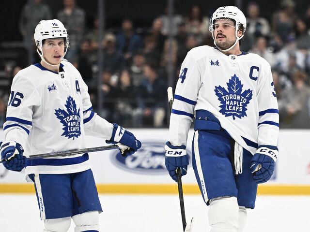 SALT LAKE CITY, UTAH - MARCH 10: Auston Matthews #34 and Mitch Marner #16 of the Toronto Maple Leafs look on during the first period of a game against the Utah Hockey Club at Delta Center on March 10, 2025 in Salt Lake City, Utah.