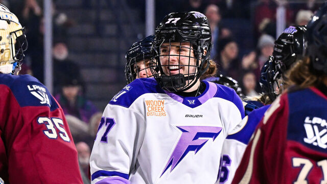 LAVAL, CANADA - JANUARY 17: Britta Curl-Salemme #77 of the Minnesota Frost smiles at the direction of goaltender Ann-Renée Desbiens #35 of the Montreal Victoire during the third period at Place Bell on January 17, 2025 in Laval, Quebec, Canada. The Montreal Victoire defeated the Minnesota Frost 4-2.