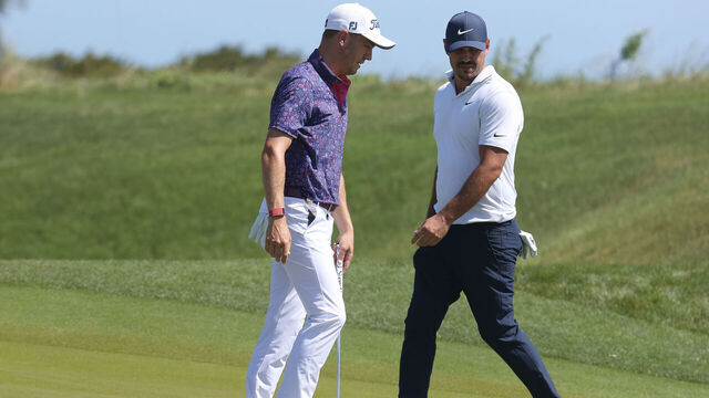 KIAWAH ISLAND, SOUTH CAROLINA - MAY 21: (L-R) Justin Thomas of the United States and Brooks Koepka of the United States prepare to putt on the sixth green during the second round of the 2021 PGA Championship at Kiawah Island Resort's Ocean Course on May 21, 2021 in Kiawah Island, South Carolina.