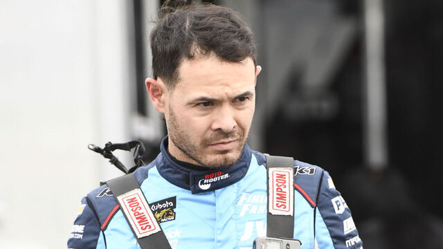 KOKOMO, IN - MAY 12: Kyle Larson (57) KL Racing (KLR) driver walks from the team hauler with gear before time trials for the Kubota High Limit Racing Monday MAYhem, May 12, 2025, on Kokomo Speedway, a .25-mile dirt oval in Kokomo, Indiana.