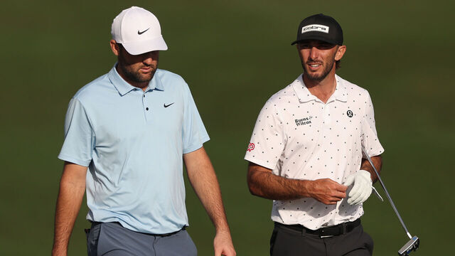 SCOTTSDALE, ARIZONA - FEBRUARY 07: Scottie Scheffler of the United States and Max Homa of the United States walk the 14th hole during the second round of the WM Phoenix Open 2025 at TPC Scottsdale on February 07, 2025 in Scottsdale, Arizona.