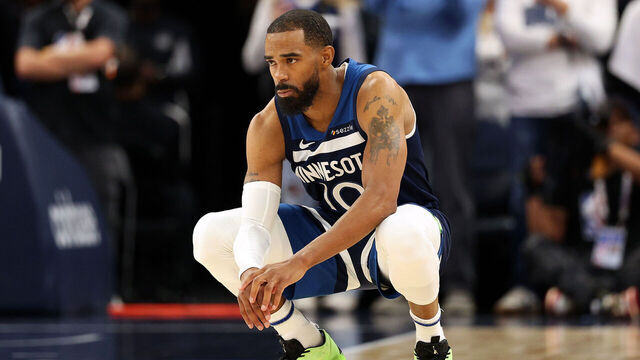 MINNEAPOLIS, MINNESOTA - APRIL 27: Mike Conley #10 of the Minnesota Timberwolves looks on against the Los Angeles Lakers prior to the start of th efirst quarter of Game Four of the First Round of the 2025 NBA Playoffs at Target Center on April 27, 2025 in Minneapolis, Minnesota. The Timberwolves defeated the Lakers 116-113 to take a 3-1 series lead.