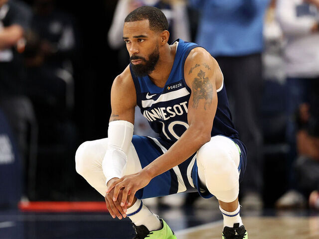 MINNEAPOLIS, MINNESOTA - APRIL 27: Mike Conley #10 of the Minnesota Timberwolves looks on against the Los Angeles Lakers prior to the start of th efirst quarter of Game Four of the First Round of the 2025 NBA Playoffs at Target Center on April 27, 2025 in Minneapolis, Minnesota. The Timberwolves defeated the Lakers 116-113 to take a 3-1 series lead.