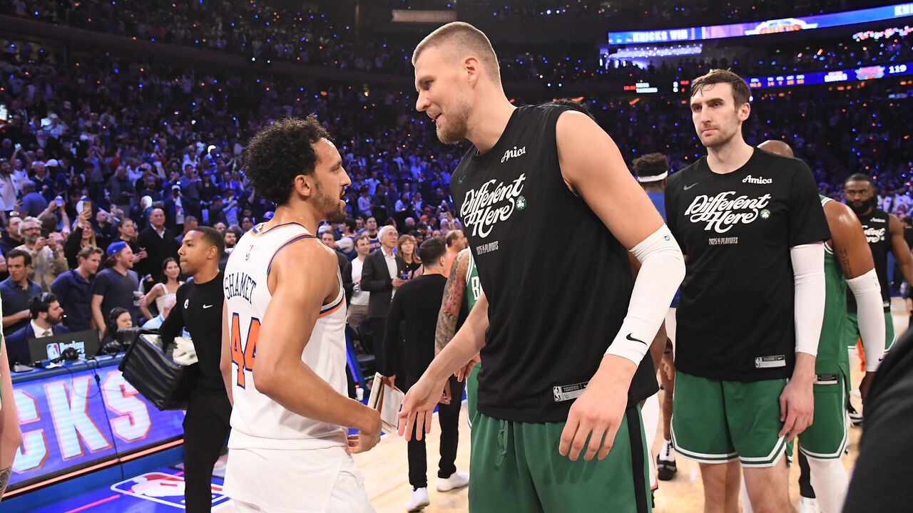 NEW YORK, NY - MAY 16: Landry Shamet #44 of the New York Knicks and Kristaps Porzingis #8 of the Boston Celtics embrace after the game during Round Two Game Six of the 2025 NBA Playoffs on May 16, 2025 at Madison Square Garden in New York City, New York. Mandatory Copyright Notice: Copyright 2025 NBAE