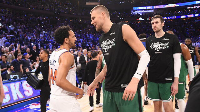 NEW YORK, NY - MAY 16: Landry Shamet #44 of the New York Knicks and Kristaps Porzingis #8 of the Boston Celtics embrace after the game during Round Two Game Six of the 2025 NBA Playoffs on May 16, 2025 at Madison Square Garden in New York City, New York. Mandatory Copyright Notice: Copyright 2025 NBAE