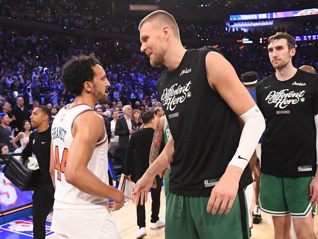 NEW YORK, NY - MAY 16: Landry Shamet #44 of the New York Knicks and Kristaps Porzingis #8 of the Boston Celtics embrace after the game during Round Two Game Six of the 2025 NBA Playoffs on May 16, 2025 at Madison Square Garden in New York City, New York. Mandatory Copyright Notice: Copyright 2025 NBAE