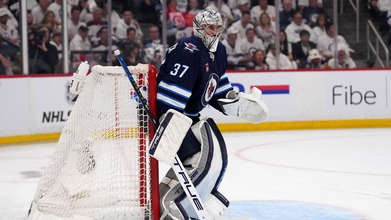 WINNIPEG, CANADA - MAY 15: Connor Hellebuyck #37 of the Winnipeg Jets defends the goal against the Dallas Stars during the third period in Game Five of the Second Round of the 2025 Stanley Cup Playoffs at Canada Life Centre on May 15, 2025 in Winnipeg, Manitoba, Canada.