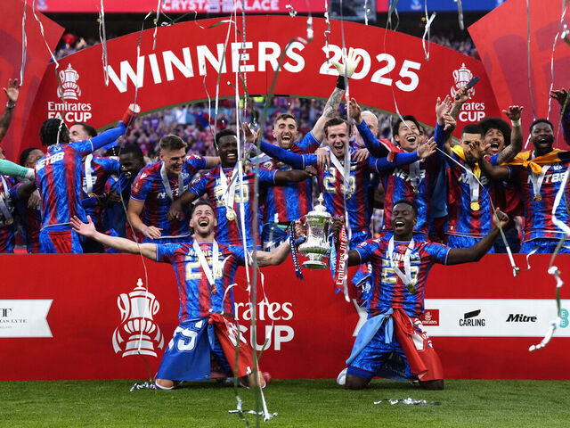 Crystal Palace playeres celebrate with the trophy following the Emirates FA Cup final at Wembley Stadium, London. Picture date: Saturday May 17, 2025.