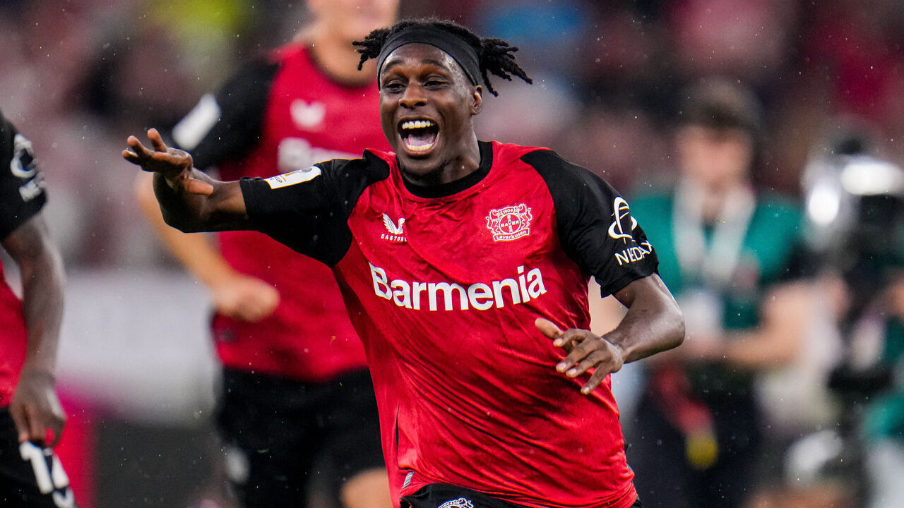 LEVERKUSEN, GERMANY - AUGUST 17: Jeremie Frimpong of Bayer 04 Leverkusen celebrates his team's win during the DFL Supercup 2024 match between Bayer 04 Leverkusen and VfB Stuttgart at BayArena on August 17, 2024 in Leverkusen, Germany.