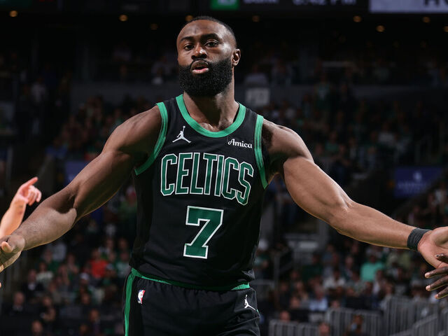 BOSTON, MA - MAY 14: Jaylen Brown #7 of the Boston Celtics high five teammates during the game against the New York Knicks during Round Two Game Five of the 2025 NBA Playoffs on May 14, 2025 at TD Garden in Boston, Massachusetts. NOTE TO USER: User expressly acknowledges and agrees that, by downloading and/or using this Photograph, user is consenting to the terms and conditions of the Getty Images License Agreement. Mandatory Copyright Notice: Copyright 2025 NBAE