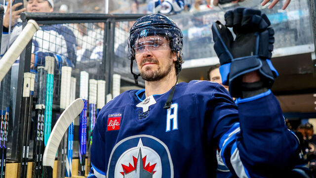 WINNIPEG, CANADA - MAY 09: Mark Scheifele #55 of the Winnipeg Jets walks towards the ice for the pre-game warm up prior to NHL action against the Dallas Stars in Game Two of the Second Round of the 2025 Stanley Cup Playoffs at Canada Life Centre on May 09, 2025 in Winnipeg, Manitoba, Canada.