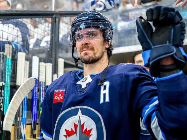WINNIPEG, CANADA - MAY 09: Mark Scheifele #55 of the Winnipeg Jets walks towards the ice for the pre-game warm up prior to NHL action against the Dallas Stars in Game Two of the Second Round of the 2025 Stanley Cup Playoffs at Canada Life Centre on May 09, 2025 in Winnipeg, Manitoba, Canada.