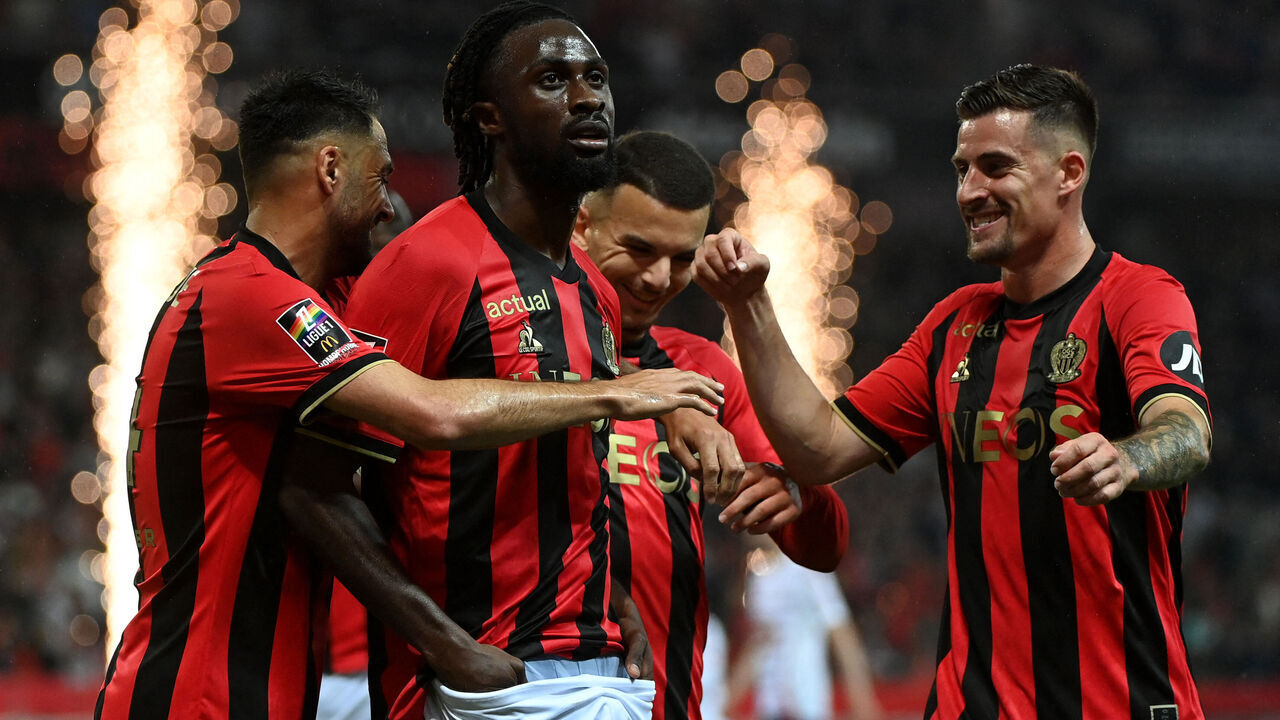 Nice's Ivorian forward #29 Evann Guessand (2nd L) celebrates with team mates after scoring a goal during the French L1 football match between OGC Nice and Stade Brestois 29 (Brest) at the Riviera Stadium in Nice, south-eastern France, on May 17, 2025.