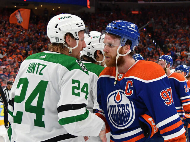 EDMONTON, CANADA - JUNE 02: Connor McDavid #97 of the Edmonton Oilers shakes hands with Roope Hintz #24 of the Dallas Stars after clinching the series in Game Six of the Western Conference Final of the 2024 Stanley Cup Playoffs at Rogers Place on June 2, 2024, in Edmonton, Alberta, Canada.