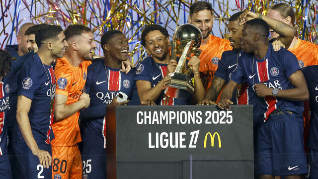 PARIS, FRANCE - MAY 17: Captain of PSG Marquinhos with Achraf Hakimi, Arnau Tenas, Nuno Mendes, Gianluigi Donnarumma, Presnel Kimpembe, Ousmane Dembele celebrate during the Ligue 1 trophy ceremony following the Ligue 1 football match between Paris Saint-Germain (PSG) and AJ Auxerre (AJA) at Parc des Princes stadium on May 17, 2025 in Paris, France.