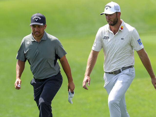 CHARLOTTE, NORTH CAROLINA - MAY 18: Xander Schauffele of the United States and Sam Burns of the United States walk to the 10th tee during the final round of the PGA Championship at Quail Hollow Country Club on May 18, 2025 in Charlotte, North Carolina.