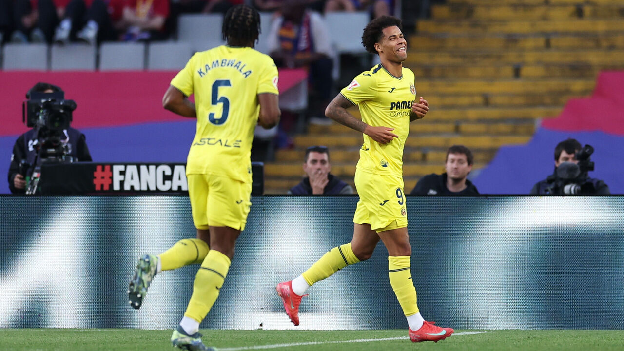 BARCELONA, SPAIN - MAY 18: Tajon Buchanan of Villarreal CF celebrates scoring his team's third goal during the La Liga EA Sports match between FC Barcelona and Villarreal CF at Estadi Olimpic Lluis Companys on May 18, 2025 in Barcelona, Spain.