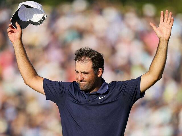 CHARLOTTE, NORTH CAROLINA - MAY 18: Scottie Scheffler of the United States celebrates on the 18th green after winning the 2025 PGA Championship at Quail Hollow Country Club on May 18, 2025 in Charlotte, North Carolina.