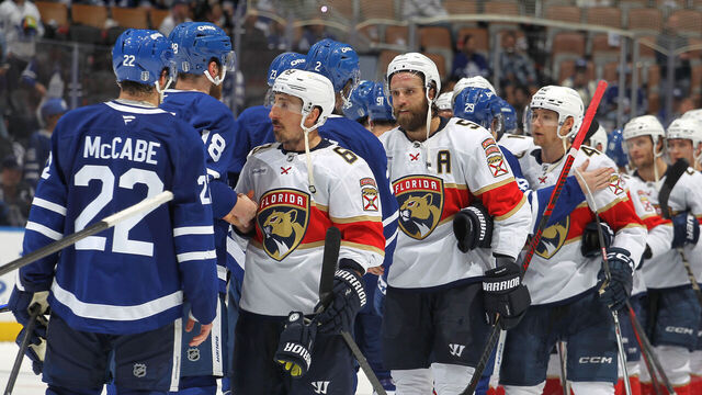 TORONTO, CANADA - MAY 18: Brad Marchand #63 of the Florida Panthers greets Steven Lorentz #18 and Jake McCabe #22 of the Toronto Maple Leafs following Game Seven of the Second Round of the 2025 Stanley Cup Playoffs at Scotiabank Arena on May 18, 2025 in Toronto, Ontario, Canada. Florida defeated Toronto 6-1.