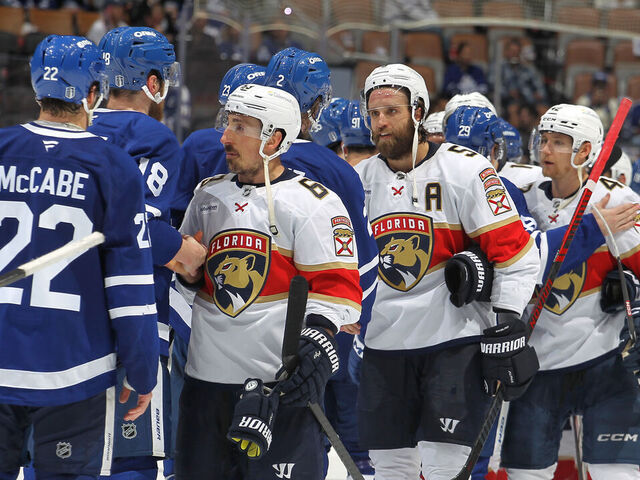 TORONTO, CANADA - MAY 18: Brad Marchand #63 of the Florida Panthers greets Steven Lorentz #18 and Jake McCabe #22 of the Toronto Maple Leafs following Game Seven of the Second Round of the 2025 Stanley Cup Playoffs at Scotiabank Arena on May 18, 2025 in Toronto, Ontario, Canada. Florida defeated Toronto 6-1.