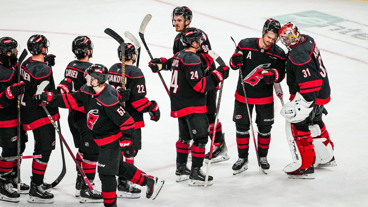 RALEIGH, NORTH CAROLINA - MAY 10: Sebastian Aho #20 and the Carolina Hurricanes celebrate with goaltender Frederik Andersen #31 of the Carolina Hurricanes after defeating the Washington Capitals 4-0 in Game Three of the Second Round of the 2025 Stanley Cup Playoffs at Lenovo Center on May 10, 2025 in Raleigh, North Carolina.