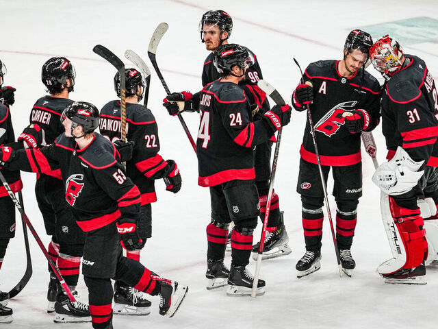 RALEIGH, NORTH CAROLINA - MAY 10: Sebastian Aho #20 and the Carolina Hurricanes celebrate with goaltender Frederik Andersen #31 of the Carolina Hurricanes after defeating the Washington Capitals 4-0 in Game Three of the Second Round of the 2025 Stanley Cup Playoffs at Lenovo Center on May 10, 2025 in Raleigh, North Carolina.