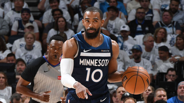 MINNEAPOLIS, MN - MAY 14: Mike Conley #10 of the Minnesota Timberwolves dribbles the ball during the game against the Golden State Warriors during Round 2 Game 5 of the 2025 NBA Playoffs on May 14, 2025 at Target Center in Minneapolis, Minnesota. Mandatory Copyright Notice: Copyright 2025 NBAE