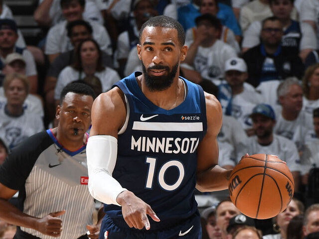 MINNEAPOLIS, MN - MAY 14: Mike Conley #10 of the Minnesota Timberwolves dribbles the ball during the game against the Golden State Warriors during Round 2 Game 5 of the 2025 NBA Playoffs on May 14, 2025 at Target Center in Minneapolis, Minnesota. Mandatory Copyright Notice: Copyright 2025 NBAE