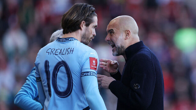 BOURNEMOUTH, ENGLAND - MARCH 30: Pep Guardiola Manager / Head Coach of Manchester City with Jack Grealish of Manchester City during the Emirates FA Cup Quarter Final match between AFC Bournemouth and Manchester City at Vitality Stadium on March 30, 2025 in Bournemouth, England.