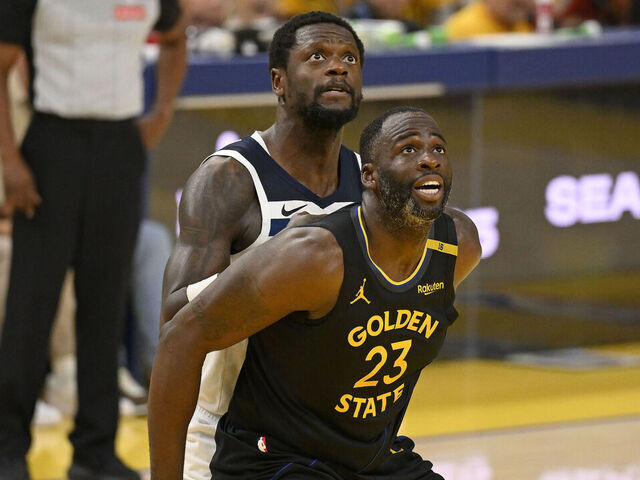 SAN FRANCISCO, CA - MAY 12: Draymond Green #23 of the Golden State Warriors and Julius Randle #30 of the Minnesota Timberwolves wait for a rebound during Round Two, Game Four of the 2025 NBA Playoffs on May 12, 2025 at Chase Center in San Francisco, California. NOTE TO USER: User expressly acknowledges and agrees that, by downloading and or using this photograph, user is consenting to the terms and conditions of Getty Images License Agreement. Mandatory Copyright Notice: Copyright 2025 NBAE