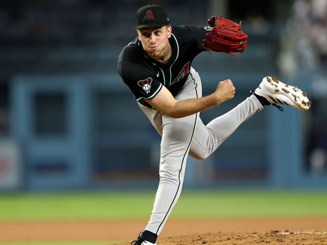 LOS ANGELES, CALIFORNIA - MAY 19: Brandon Pfaadt #32 of the Arizona Diamondbacks pitches against the Los Angeles Dodgers during the third inning at Dodger Stadium on May 19, 2025 in Los Angeles, California.