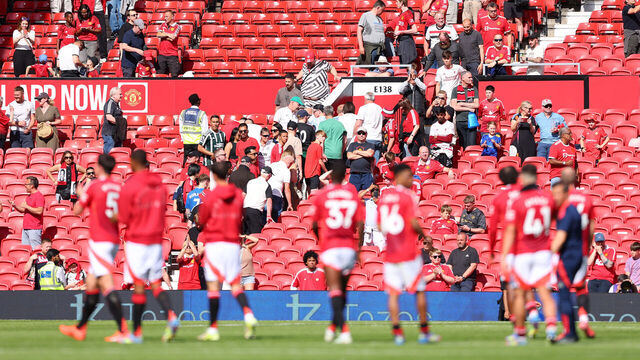 MANCHESTER, ENGLAND - MAY 11: Manchester United players applaud fans as they leave after the Premier League match between Manchester United FC and West Ham United FC at Old Trafford on May 11, 2025 in Manchester, England.