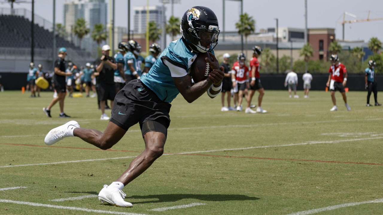 JACKSONVILLE, FL - MAY 19: Jacksonville Jaguars wide receiver Travis Hunter (12) runs with a ball during the Jacksonville Jaguars OTA on May 19, 2025 at Miller Electric Center in Jacksonville, Fl.