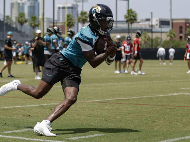 JACKSONVILLE, FL - MAY 19: Jacksonville Jaguars wide receiver Travis Hunter (12) runs with a ball during the Jacksonville Jaguars OTA on May 19, 2025 at Miller Electric Center in Jacksonville, Fl.