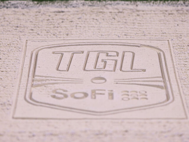 PALM BEACH GARDENS, FLORIDA - MARCH 24: A detailed view of a TGL presented by Sofi logo imprinted in the sand before the TGL presented by SoFi match between the Atlanta Drive GC and the New York Golf Club at SoFi Center on March 24, 2025 in Palm Beach Gardens, Florida.
