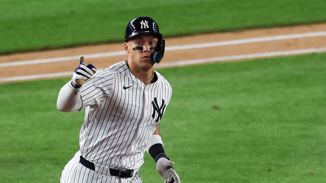 NEW YORK, NY - MAY 20: Aaron Judge #99 of the New York Yankees hits a two-run home run during the game against the Texas Rangers at Yankee Stadium on May 20, 2025 in New York, New York.