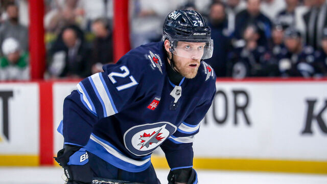 WINNIPEG, CANADA - MAY 15: Nikolaj Ehlers #27 of the Winnipeg Jets looks on as he gets set during a second period face-off against the Dallas Stars in Game Five of the Second Round of the 2025 Stanley Cup Playoffs at the Canada Life Centre on May 15, 2025 in Winnipeg, Manitoba, Canada. The Jets shutout the Stars 4-0 and trail the series 3-2.