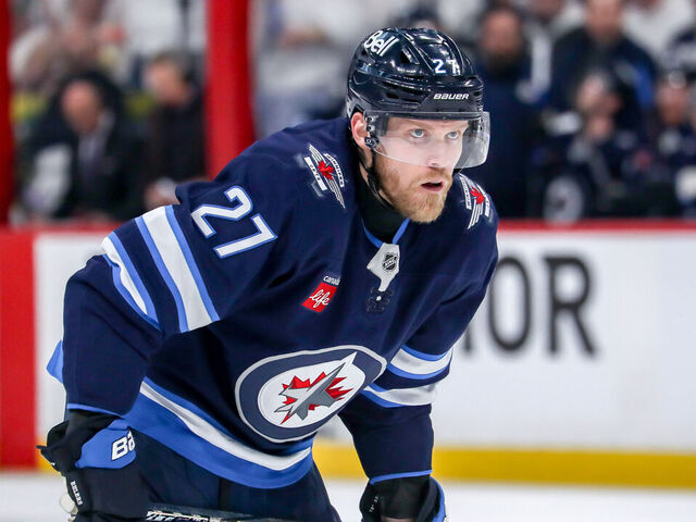 WINNIPEG, CANADA - MAY 15: Nikolaj Ehlers #27 of the Winnipeg Jets looks on as he gets set during a second period face-off against the Dallas Stars in Game Five of the Second Round of the 2025 Stanley Cup Playoffs at the Canada Life Centre on May 15, 2025 in Winnipeg, Manitoba, Canada. The Jets shutout the Stars 4-0 and trail the series 3-2.