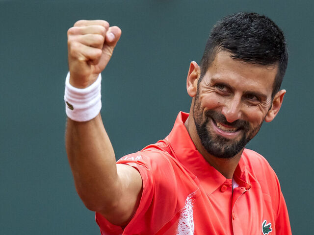 Serbia's Novak Djokovic celebrates his victory at the end of his match against Hungary's Marton Fucsovics at the ATP 250 Geneva Open tennis tournament in Geneva on May 21, 2025.