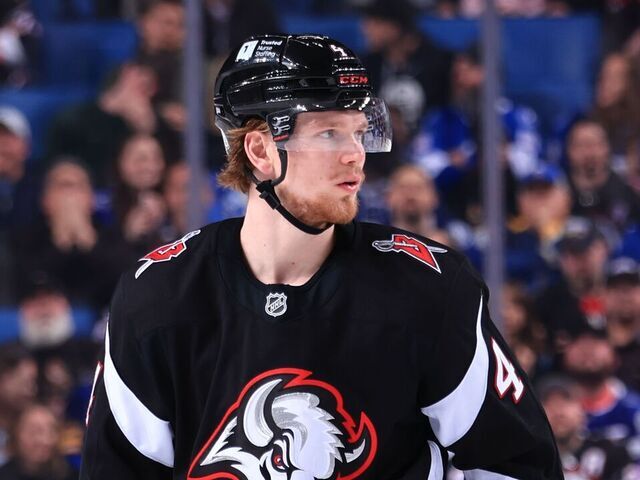 BUFFALO, NEW YORK - APRIL 5: Bowen Byram #4 of the Buffalo Sabres prepares for a faceoff against the Tampa Bay Lightning during an NHL game on April 5, 2025 at KeyBank Center in Buffalo, New York.