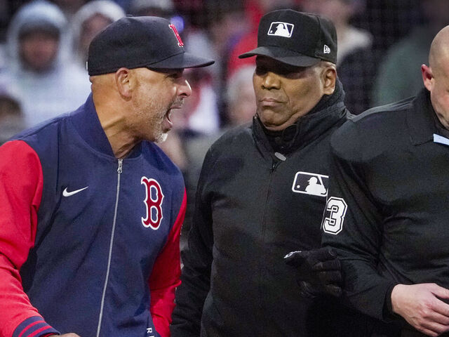 Boston, MA - May 20: Boston Red Sox manager Alex Cora was ejected after arguing a call with home plate umpire Mike Estabrook (83) during the third inning. The Boston Red Sox host the New York Mets on Tuesday, May 20, 2025 at Fenway Park in Boston, MA.