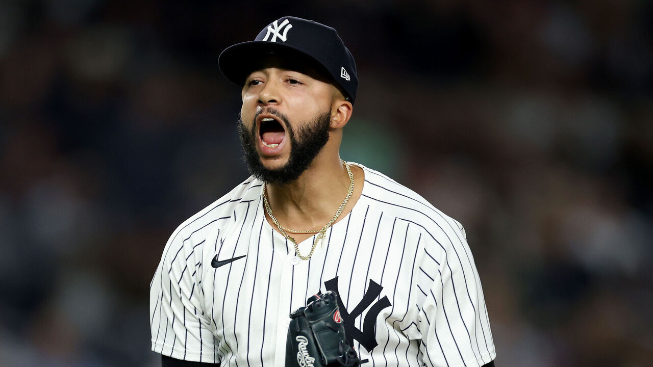 NEW YORK, NEW YORK - MAY 20: Devin Williams #38 of the New York Yankees reacts after retiring the Texas Rangers during the eighth inning at Yankee Stadium on May 20, 2025 in New York City.