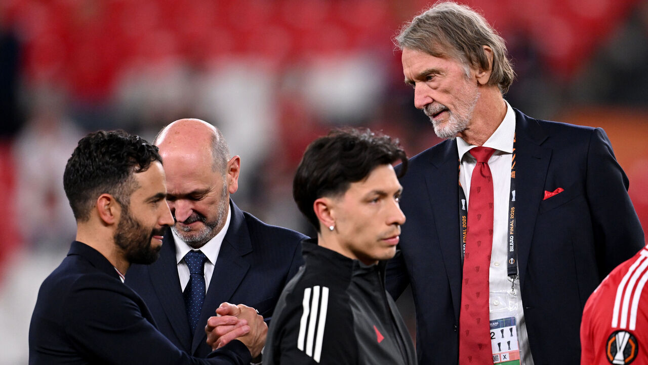 BILBAO, SPAIN - MAY 21: Sir Jim Ratcliffe, Co-owner of Manchester United, shakes hands with Ruben Amorim, Manager of Manchester United, as he walks to the podium to collect his runners-up medal after the UEFA Europa League Final 2025 between Tottenham Hotspur and Manchester United at Estadio de San Mames on May 21, 2025 in Bilbao, Spain.